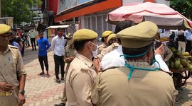 Clashes with police at a protest against rising fuel rates in Prayagraj, India