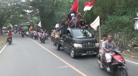 Welcome to Euro 2020: Thousands of Indonesian soccer fans carry country flags in convoy