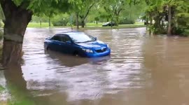 Cars stranded in flooded Canadian roads due to severe thunderstorm