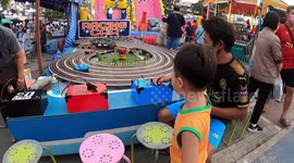 Awesome large Scalextric style race track at a carnival in Thailand