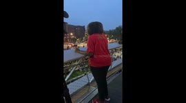 Eric Garner’s mother giving a speech to a crowd in Brooklyn