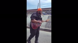 A creative protester deploy his skills in encouraging protesters, sings about the state of the nation.