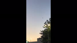 Police helicopter circles overhead as huge police presence ion site at London Eye due to gathering of drunken teenagers gets rowdy