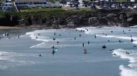 Surfers out early at Polzeath ahead of what could be UK's hottest day of the year