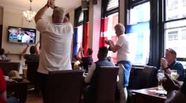 England fans celebrate victory over Croatia at pub: 'It’s coming home!'