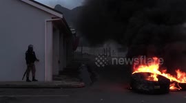 Violent clashes between police and protesters in Hout Bay Harbour, Cape Town