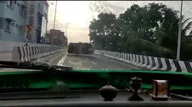 Overtaking car topples over after avoiding collision with oncoming vehicle in India