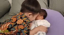 Adorable moment of elder brother excited to see his newborn sister