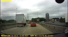 Lorry close call almost causing a crash at island in the UK dashcam