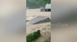 Flood washes away homes as tropical storm Koguma makes landfall in Laos