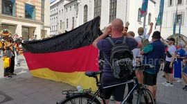 French and German fans celebrating together ahead of Germany France