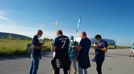 Fans present their COVID-19 test result in order to get a wristband allowing them entry to Germany-France