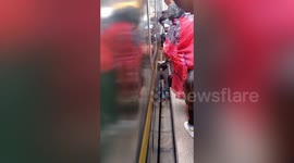 University student rescues child who fell into gap between train and platform in China