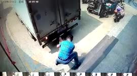 Chinese man rescues boy in way of reversing truck
