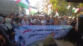 Palestinians march around Gaza in response to Israeli flag-waving march