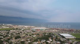 Big outflow boundary (shelf cloud) kicking up dust moving over Galveston, Texas