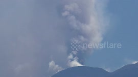 Daylight over the last eruption of Mount Etna, clouds and dust over the Sicilian Skies.