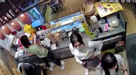 Steel strip narrowly misses restaurant employees after falling from ceiling