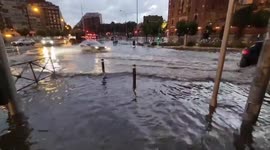 Streets of Spanish capital flooded after storm blasts city