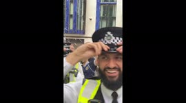 Scotland fans spray laughing London police with booze