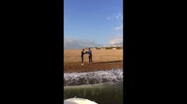 Pizza delivery to a boat off seaford beach in sussex