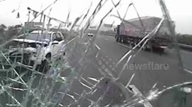 Car crashes into bus on China highway