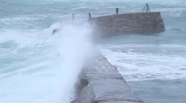 Wintry weather during summer in Cornwall, UK