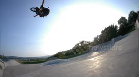 Bike Rider jumps very high and takes his hands off!