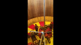 Man rides motorbike on vertical wall