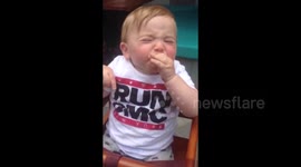 Cute baby tries sparkling water for first time