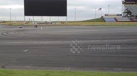 Race Car Drifts in parking lot