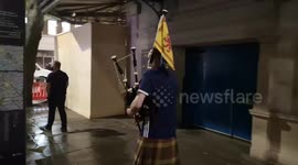 Kilted piper plays long into the night to entertain Scotland fans