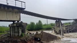 Railway bridge washed way by flash floods in northern China