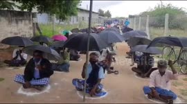 Umbrellas used for social distancing as liquor stores reopen in southern India