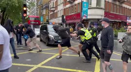Skirmishes between England and Scotland fans outside Leicester Square Tube station