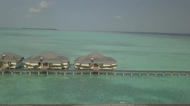 Drone footage over watervilla in the Maldives islands