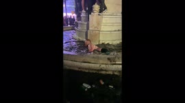 Scottish Fans Swims inside Leicester Square Fountain after the Euros Match