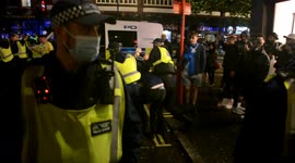 Fans clash with police in London's Leicester Square during England-Scotland match