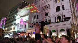 Scottish fans celebrate in London'a Leicester Square after Euro 2020 game