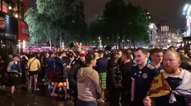 Scottish football fans fill London's Leicester Square to celebrate draw against England