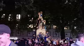 Scottish Football fans Climb Over William Shakespeare