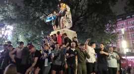 Euro2020: Scots football fans in London use Shakespeare statue as climbing frame