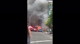 Thick plume of smoke billows from car fire in Queens, New York