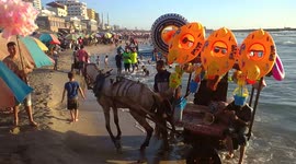Palestinians relax on Gaza's beaches after the conflict with Israel