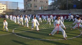 Children attend a karate graduation ceremony in Gaza