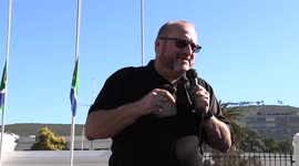 White South African political activist name calls black politicians at gun law protest