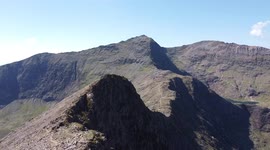 Amazing aerial footage of Snowdonia in Wales. Bank Holiday Summer 2021. Drone footage along the cool Cliff Walk along Y Lliwed. Peaceful natural trail and scrambling in the UK
