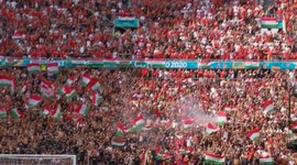 Hungarian fans celebrate the first point of their team in this Euro, after a draw against France, former Euro finalist and current World champions