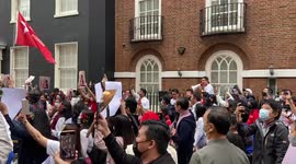 Protesters sing Happy Birthday to Aung San Suu Kyi outside the Myanmar Embassy in London, UK