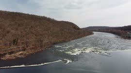 Man fly fishing in the middle of Delaware River (ALT wide and close up and shots)